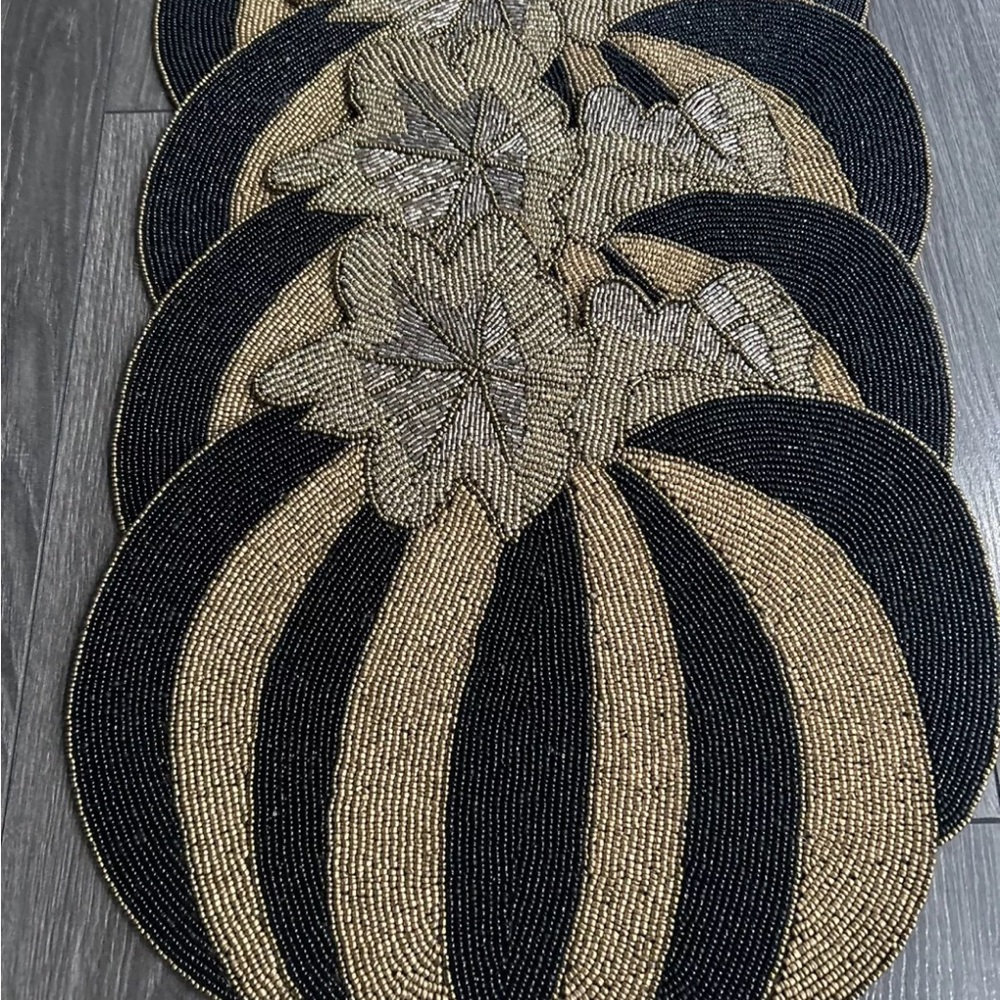 One Mackenzie Childs gold black beaded pumpkin placemats 4 available